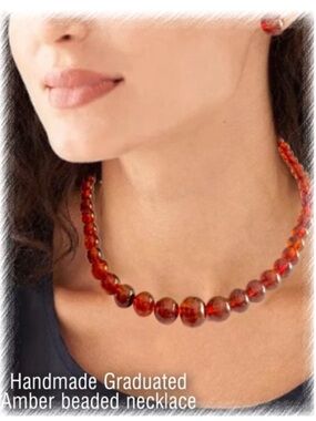 Genuine Amber beaded necklace graduated 20” length red-orange rusty color